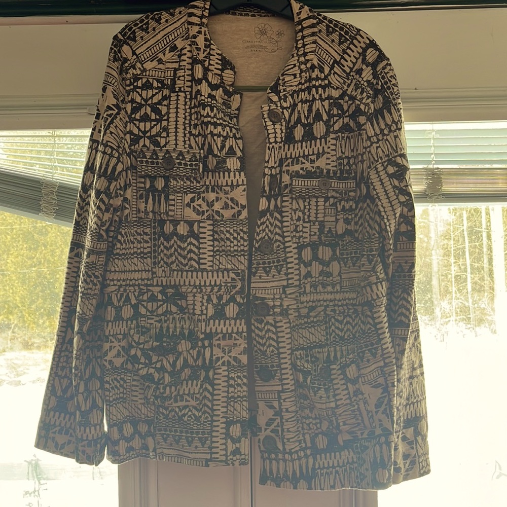 Used in good condition like new! Great design and nice sized brown buttons!